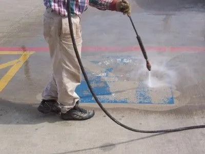 Water blasting pavement preparation